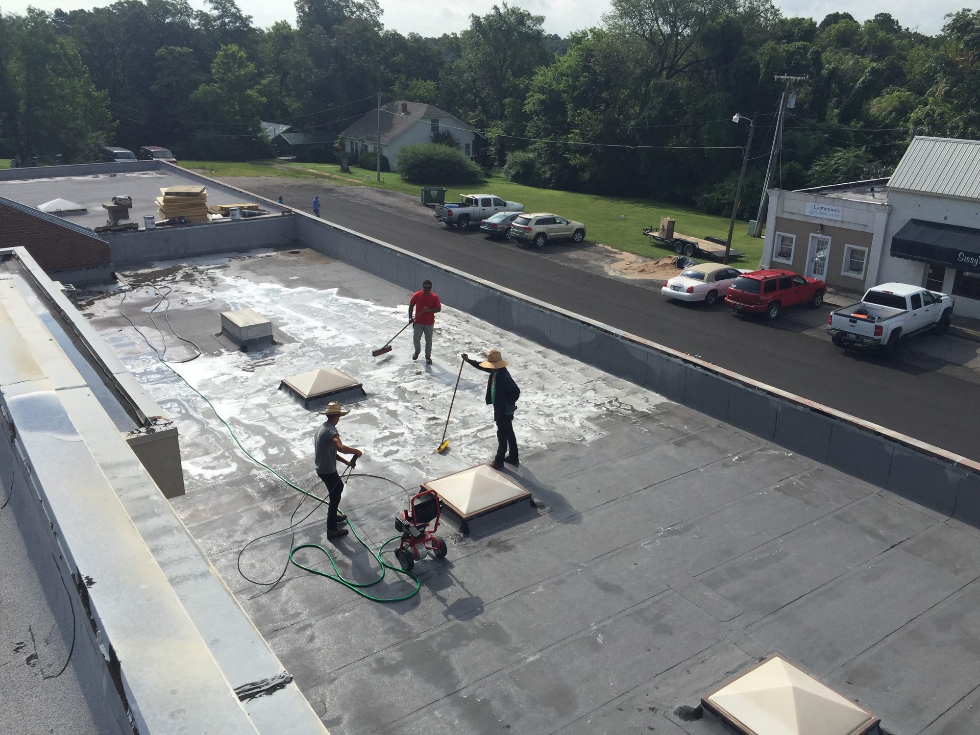 Roofspan crew working a commercial roof in Jay, Oklahoma
