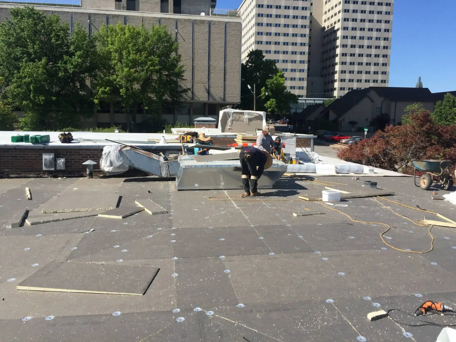 Crew laying new insulation on the Tulsa Opera roof