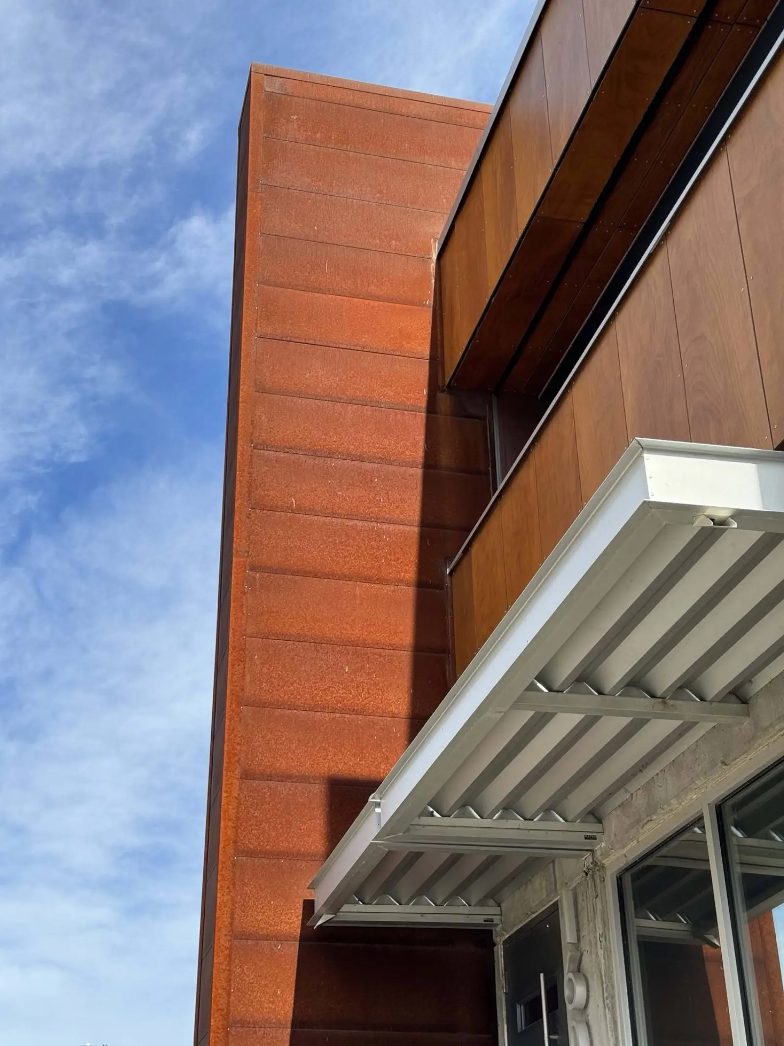Corten panel corner and sunshade